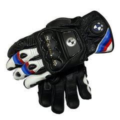 A pair of black leather BMW racing gloves with white panels and blue and red accents, featuring the BMW roundel logo and M-series color stripes.