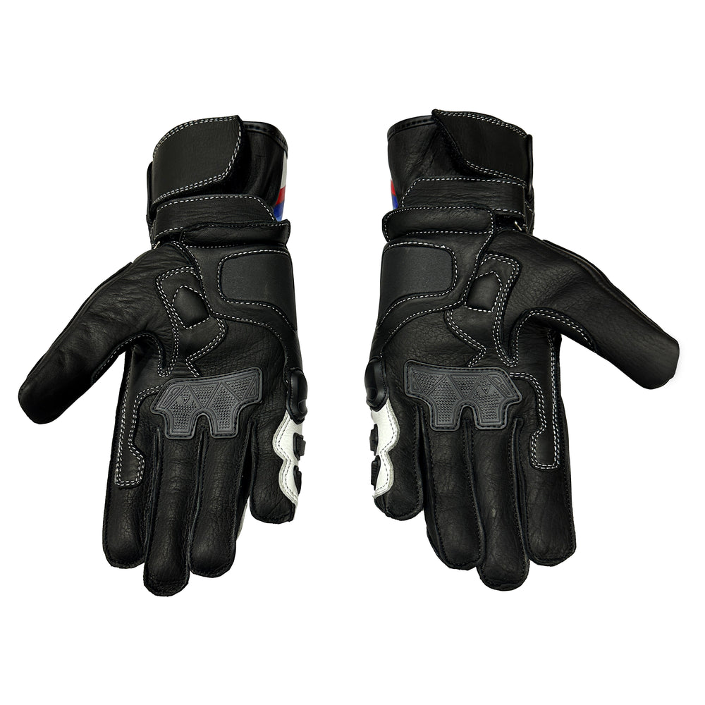 A pair of black leather motorcycle gloves shown from the back, featuring white protective padding on the knuckles and back of hand, black grip panels, and white stitching, set against a plain white background.