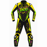 The Daeox custom motorcycle leather racing suit front view in black, fluoro green, yellow and purple with splatter graphics and knee sliders