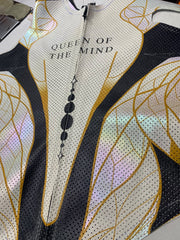 perforated kangaroo leather and iridescent gold-patterned panels on a women’s bespoke motorcycle suit