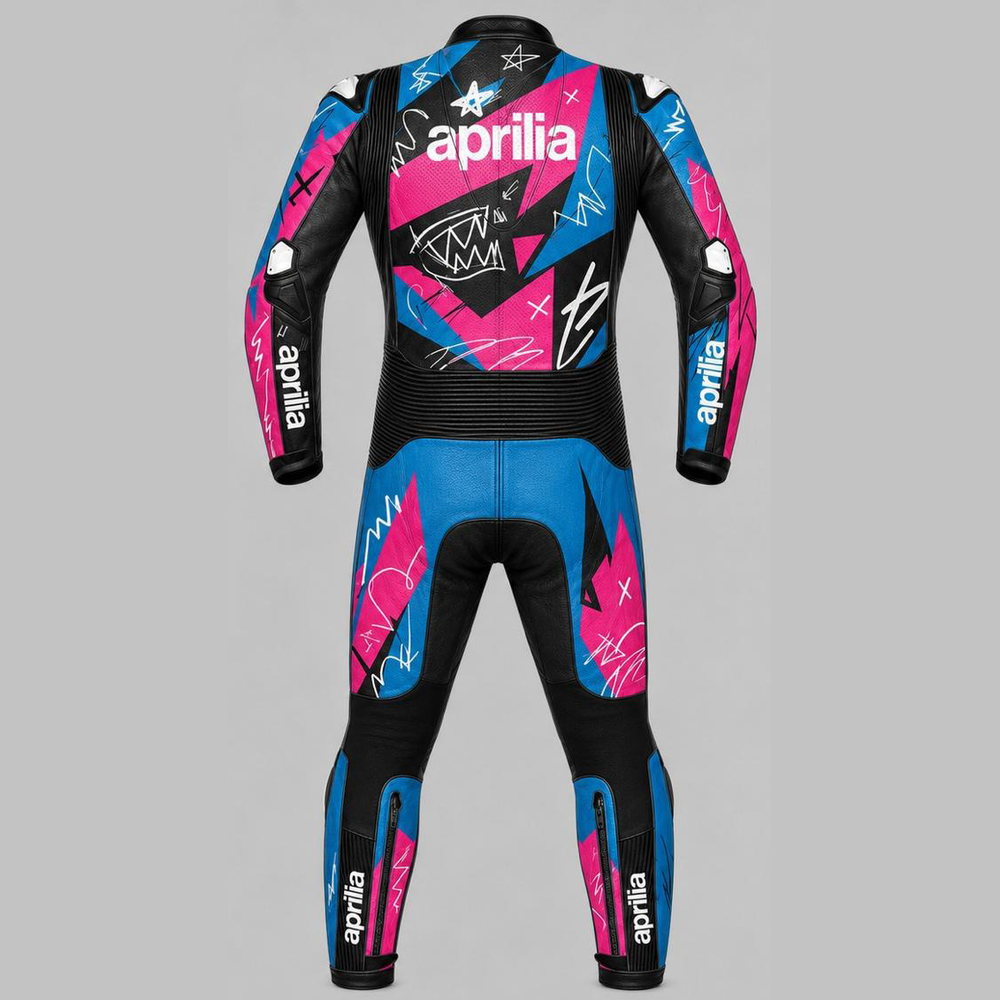 A full-body rear view of a motorcycle racing suit on a headless mannequin, featuring a black base with vibrant pink and blue graphic panels and white 'aprilia' branding.