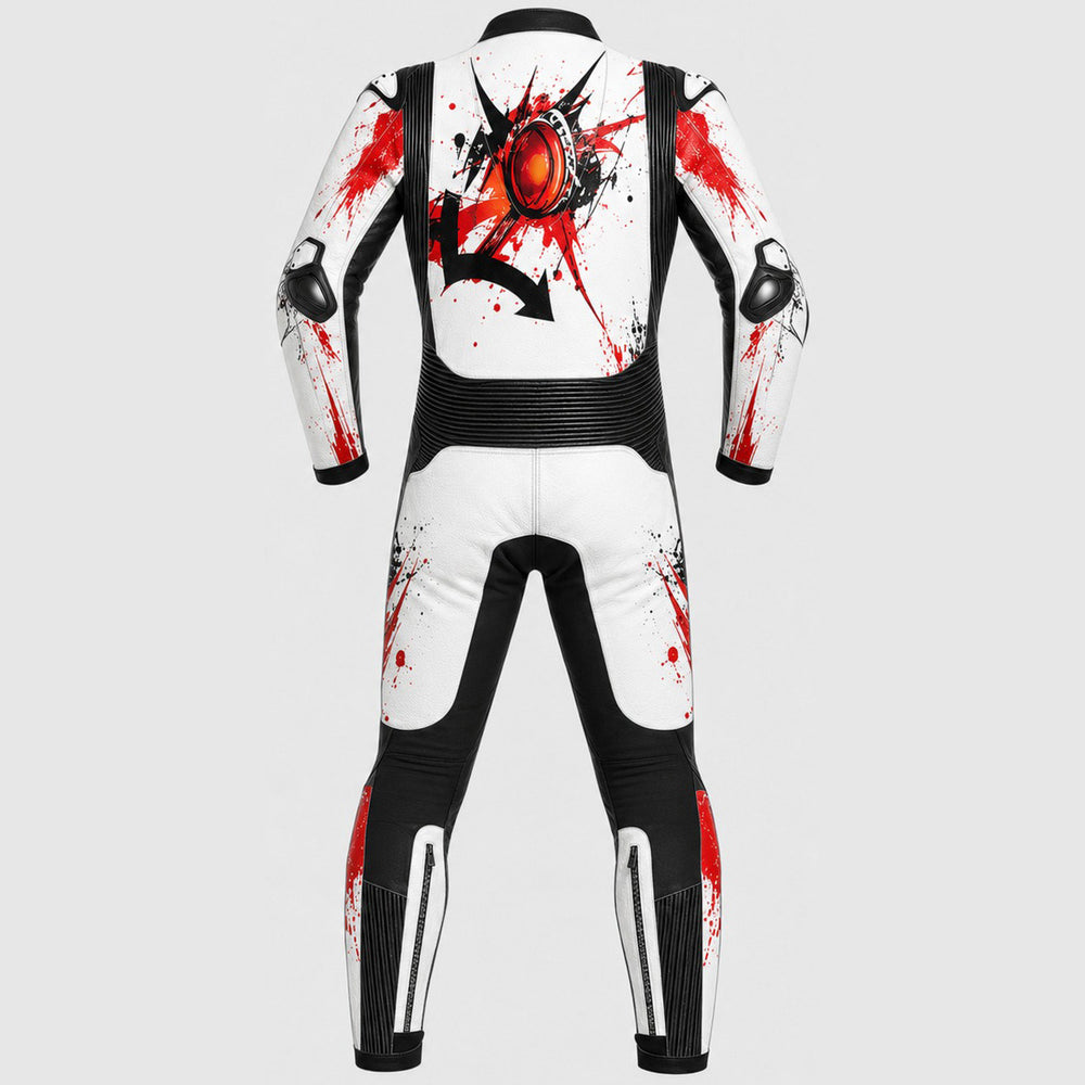 A full-body white and black racing suit shown from the back, featuring a large red and black graphic on the upper back and red paint-splatter accents on the arms and legs, set against a solid light gray background.
